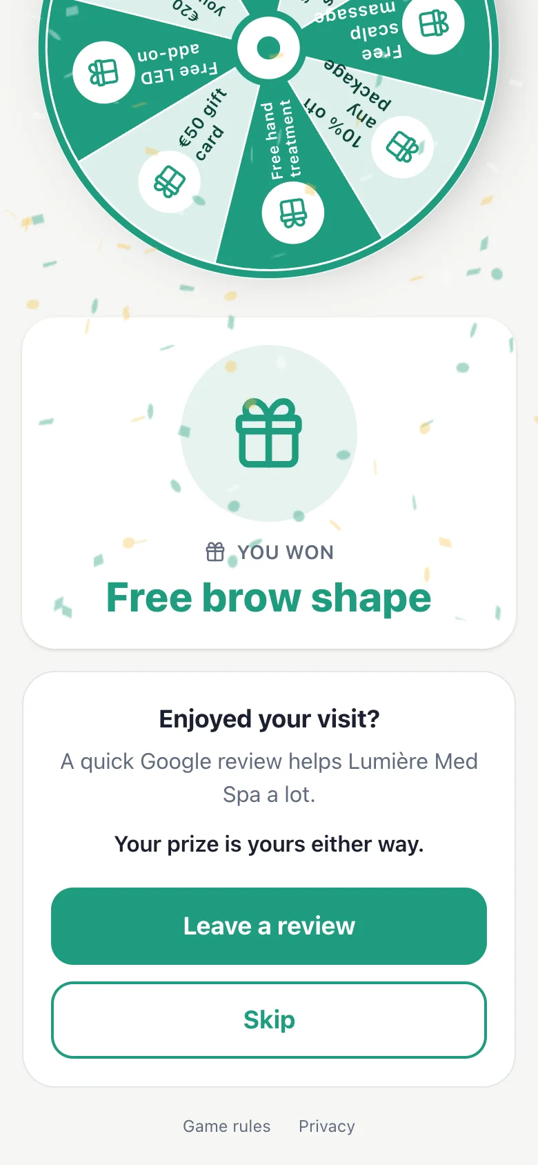 Spin on a phone. The guest sees the prize first, then an optional Google review button.